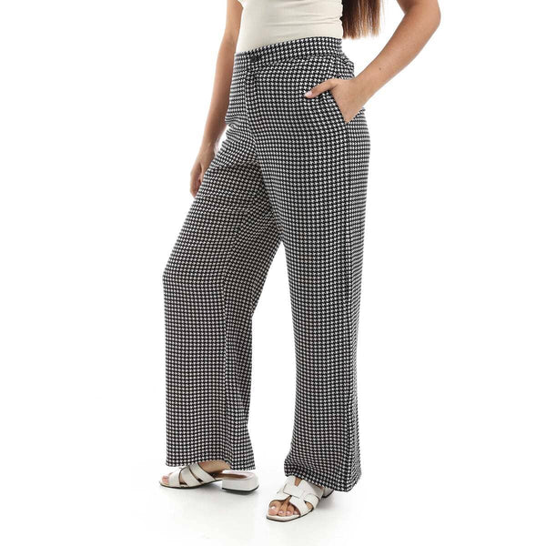 Women's satin trousers in a stylish black and white color.