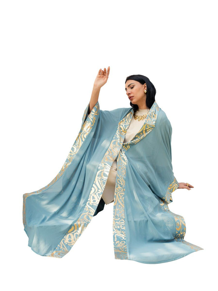 قفطان أزرق بخطوط عربية