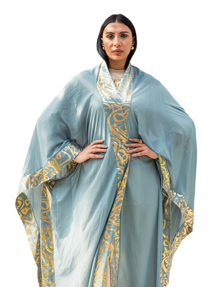 قفطان أزرق بخطوط عربية