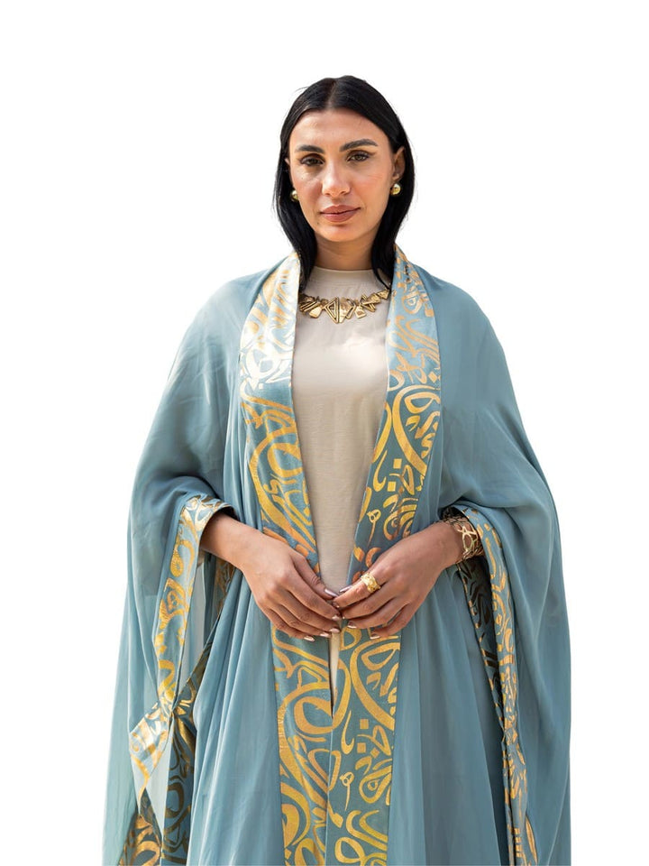 قفطان أزرق بخطوط عربية