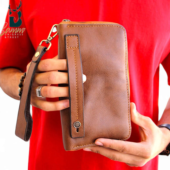 شنطة يد رجالي أنيقة من الجلد الطبيعي – متعددة الاستخدام بيد ثابتة وقابلة للإزالة.