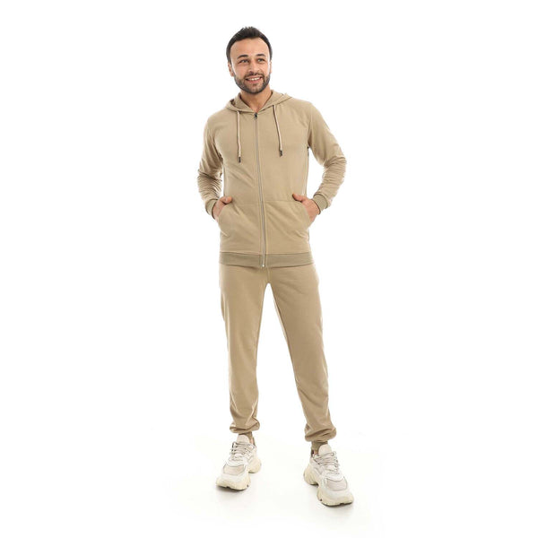 Men's zip-up hoodie with matching pants, made of cotton, and a hood.
