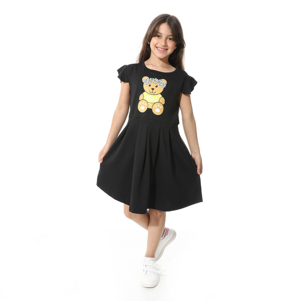 Girls' dress with a front print in a stylish teddy bear design
