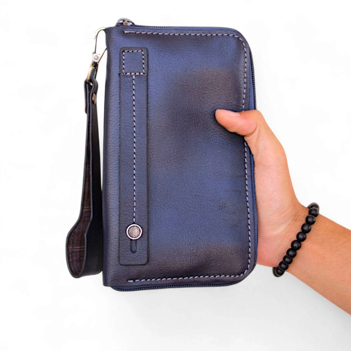 شنطة يد رجالي أنيقة من الجلد الطبيعي – متعددة الاستخدام بيد ثابتة وقابلة للإزالة.