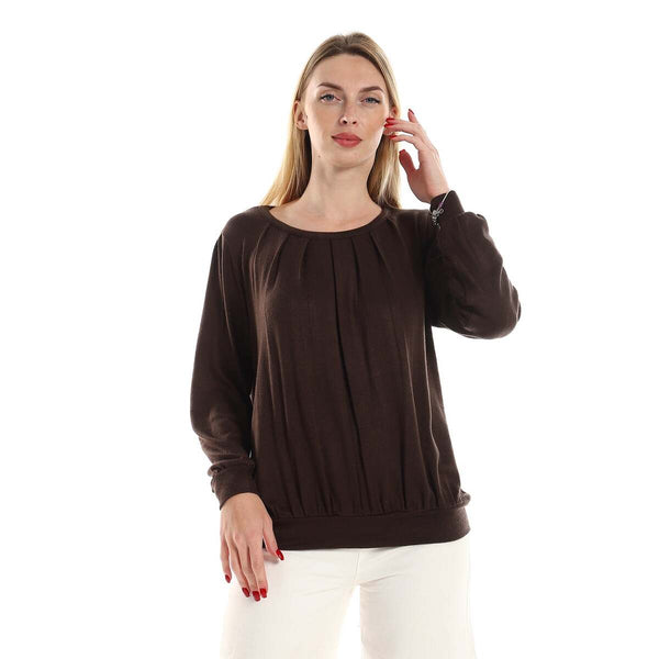 Women's knitted sweater with a round neck and decorative hem